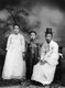 Korea: A Korean family posing for a studio portrait, Seoul, early 20th century